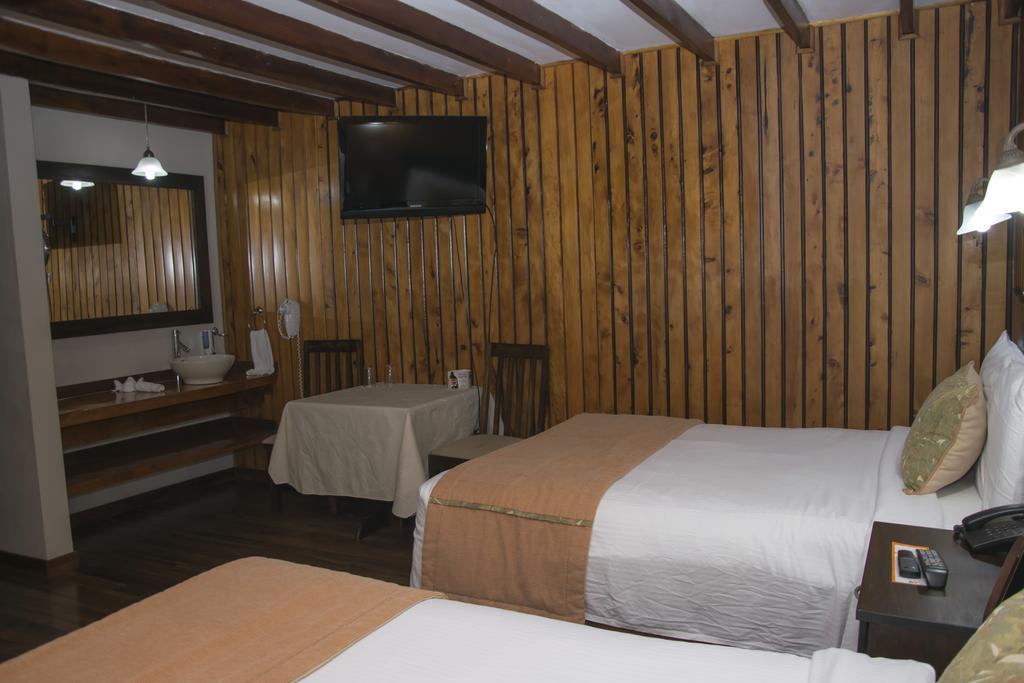 Hotel Chalet Tirol Heredia Szoba fotó